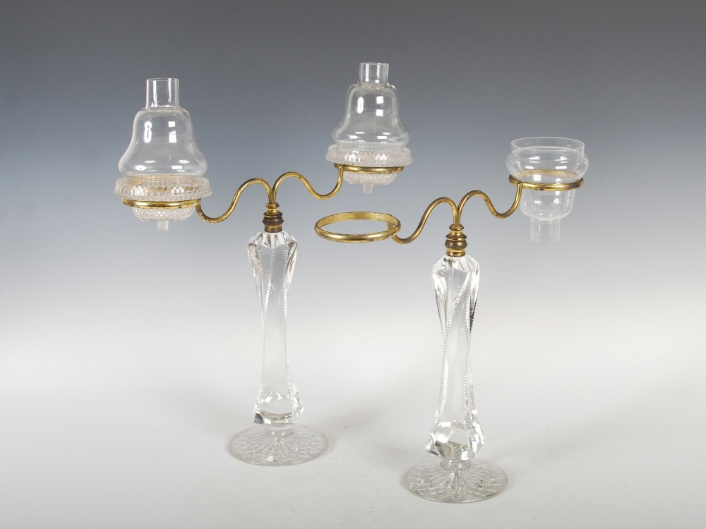 A pair of late 19th century Clarke`s Patent `Cricklite` candelabra, the gilt metal arms supporting