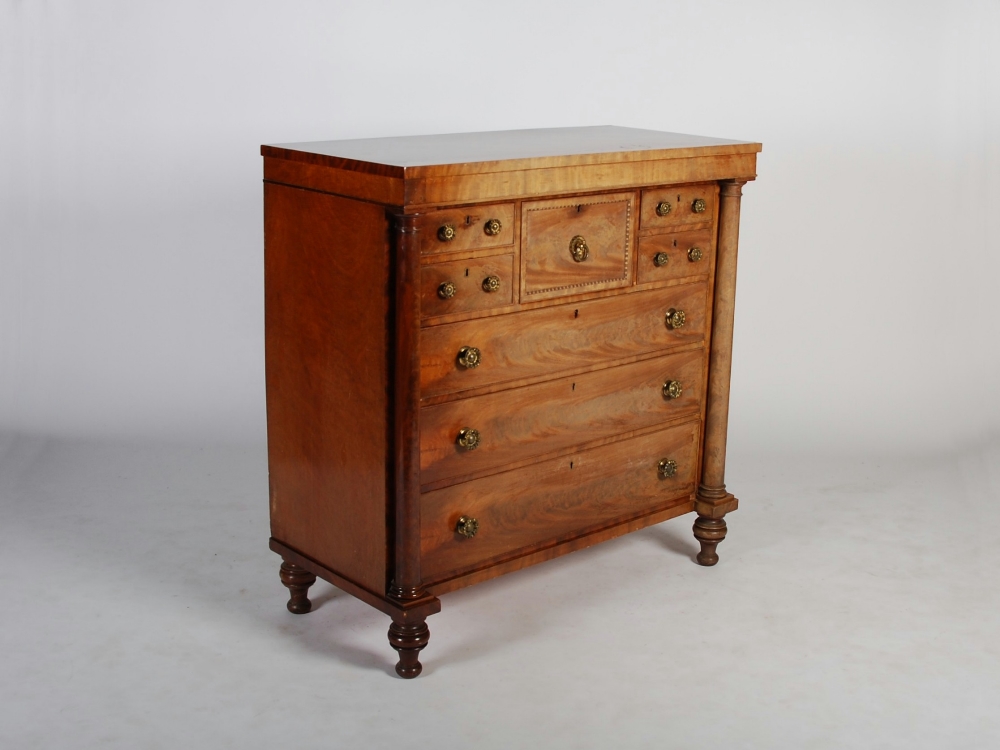 A 19th century mahogany Scottish chest, the rectangular top above a deep central frieze drawer