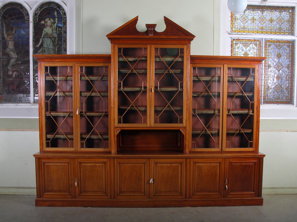 An impressive late Victorian mahogany bookcase of large size, the breakfront centre section with