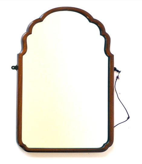 A George I-style wall mirror with arched plate and walnut frame, 64 x 39cm CONDITION REPORT: