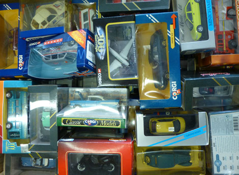 A collection of diecast models including Corgi Classics, Majorette, Mini Champs and others, each