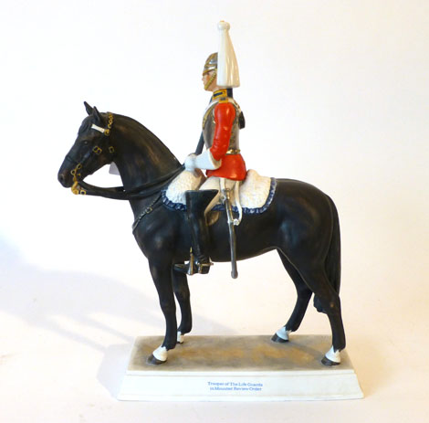 A Goebels porcelain equestrian figure modelled as a Trouper of Life Guards in Mounted Review