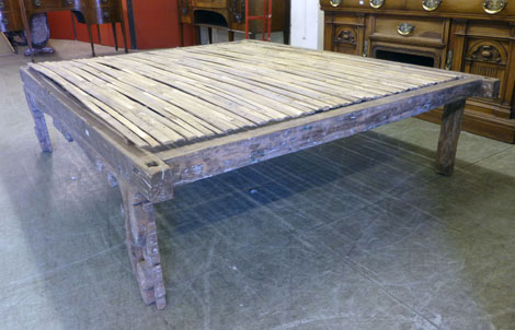 A Eastern hardwood double bed base frame with carved panels, 2105cm x 175cm