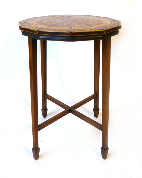 An Edwardian inlaid mahogany side table, twelve sided top, marquetry inlaid with geometric star form