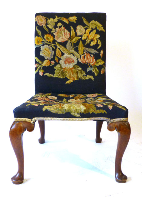 An 18th century Gainsborough type chair with tapestry upholstered back and seat on mahogany cabriole