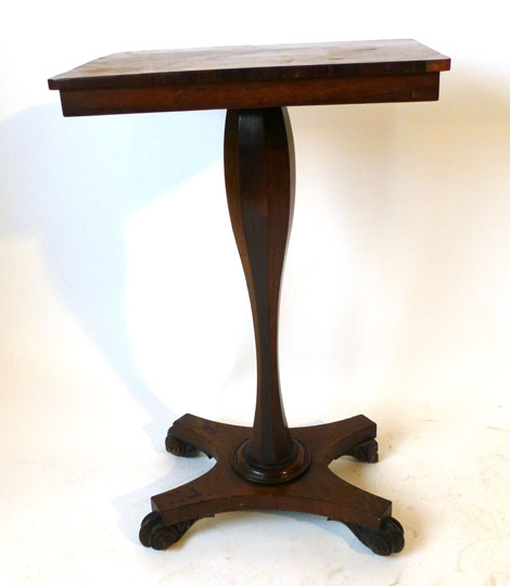 A 19th century rosewood occasional table with rectangular top on octagonal column and quatrefoil
