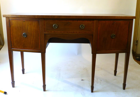 George III style crossbanded mahogany bow fronted sideboard with a single drawer flanked by a pair