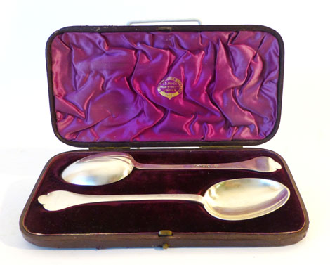 A pair of Victorian Britannia standard silver trefoil and rattail table spoons, F H London hallmark,