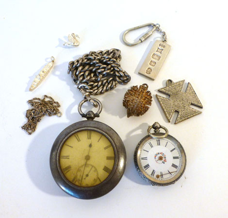 A collection of silver jewellery comprising a silver cased pocket watch on a heavy curb link watch