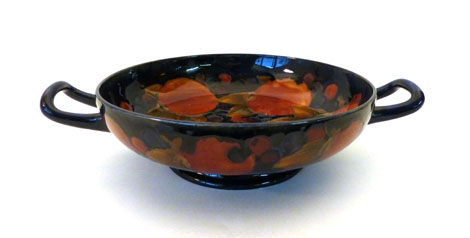 A Moorcroft "Pomegranate" pattern twin handled fitted bowl of squat form, blue signature and