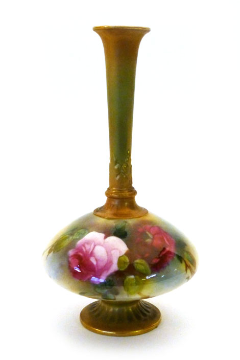 A Royal Worcester vase of onion form, painted with roses on a cream ground with a bordered slender