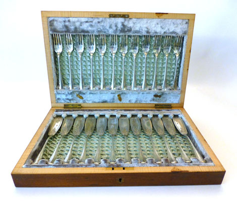 A cased set of twelve pairs of silver plated Old English pattern fish knives and forks, each with