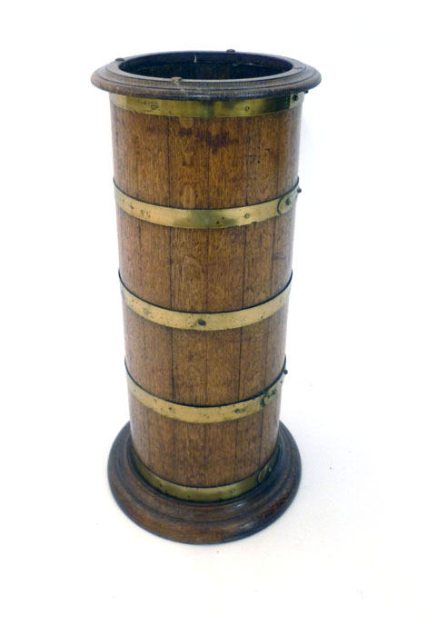 An Edwardian coopered oak stick stand with liner and gilt brass banding, h66cm CONDITION REPORT: