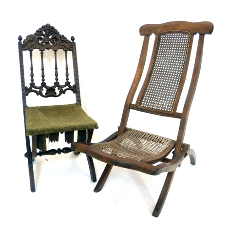 A Victorian walnut folding cabin chair with bergere seat and back together with one other folding