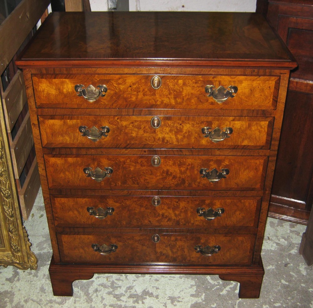 CHEST, Georgian style burr walnut and crossbanded with five drawers, 91cm H x 74cm x 46cm.