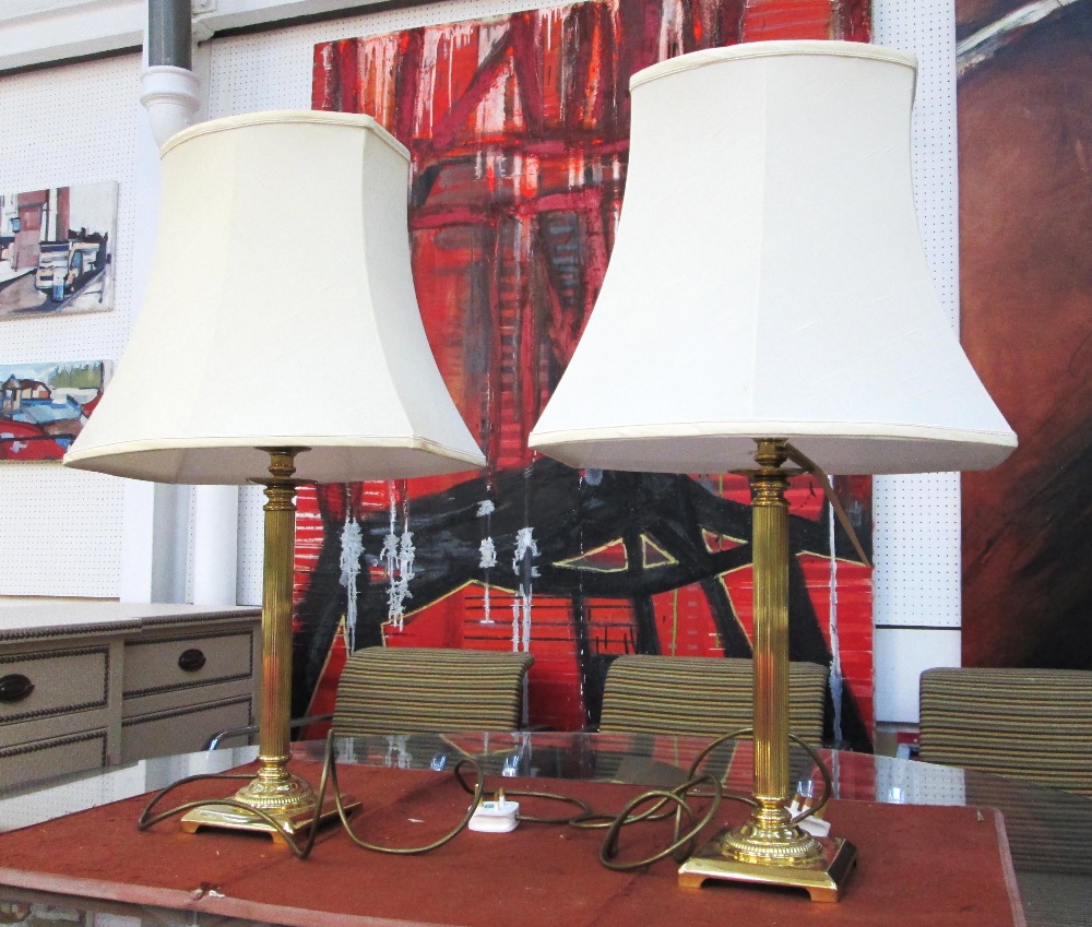 TABLE LAMPS, a pair, brass based with cream shades, 72cm H. (2)