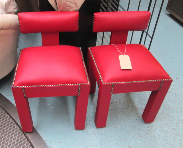 MOROCCAN CHAIRS, a pair, allover close nail red leather upholstered with low T shaped backs and