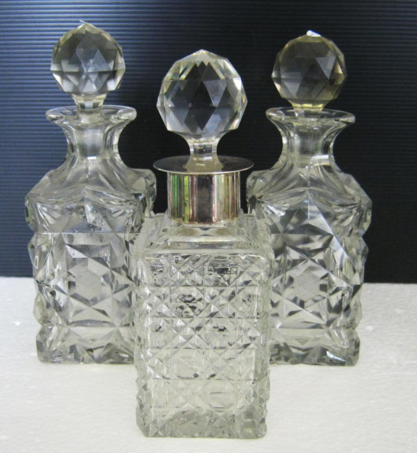 SMALL DECANTERS, Victorian, to include; a pressed glass and silver mounted example and a pair of cut