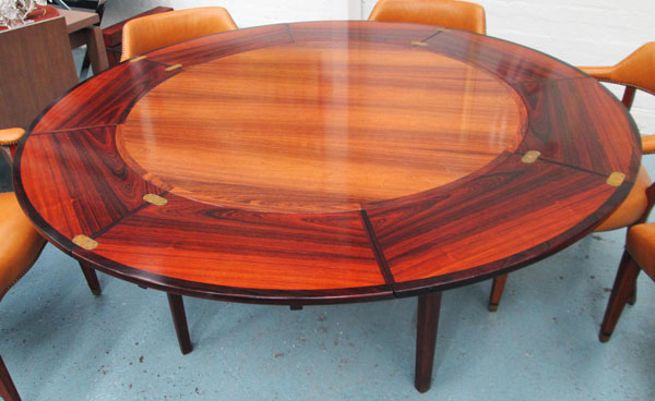 DINING TABLE, lotus design by Drylund from Harrods, Danish rosewood, extending with segmented hinged