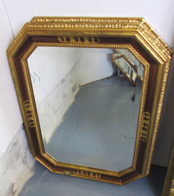 MIRRORS, a pair, bevelled in ornate gilded frames, 88cm x 60cm. (2)