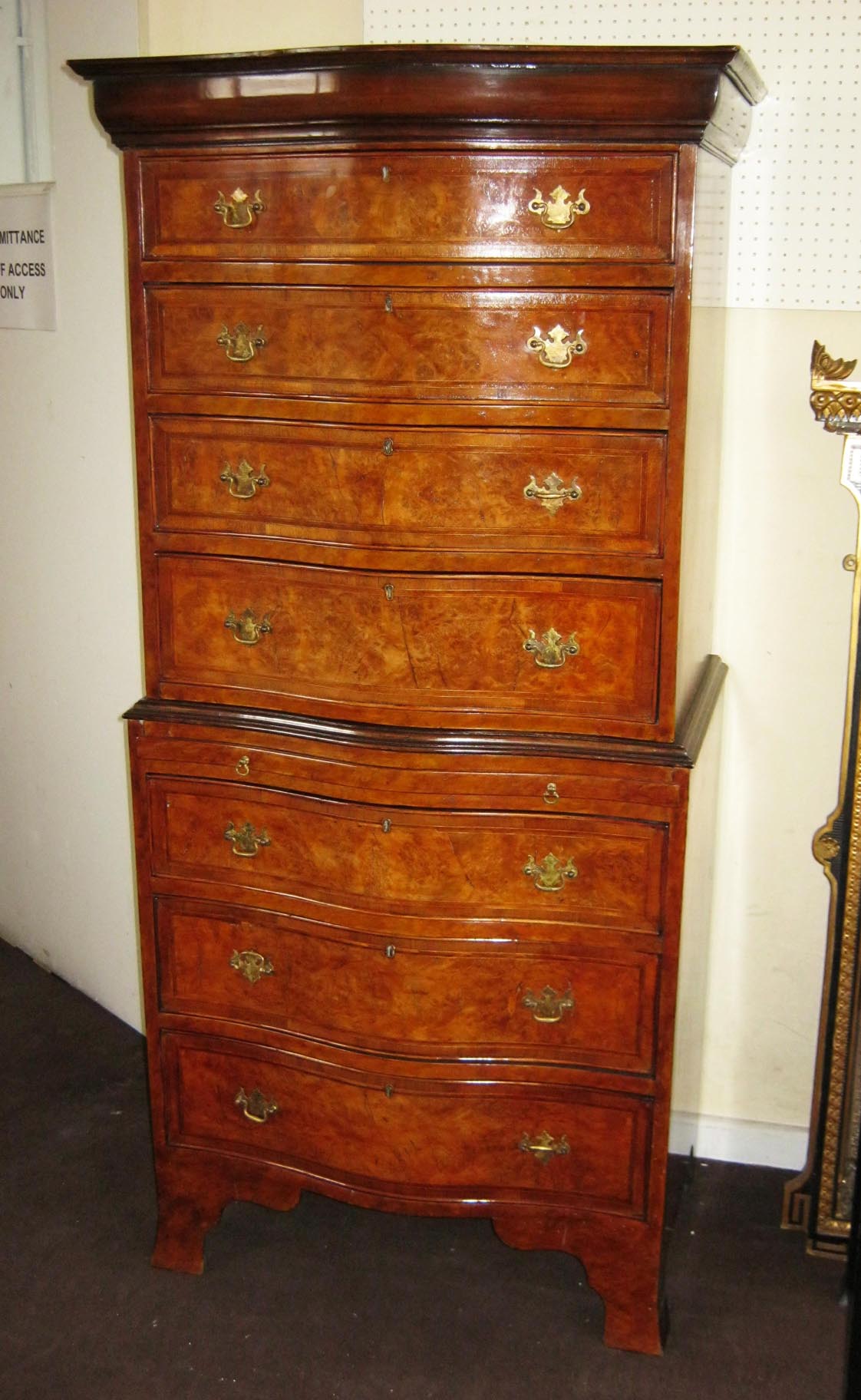 SERPENTINE CHEST ON CHEST, George III style burr walnut of two short and six long drawers