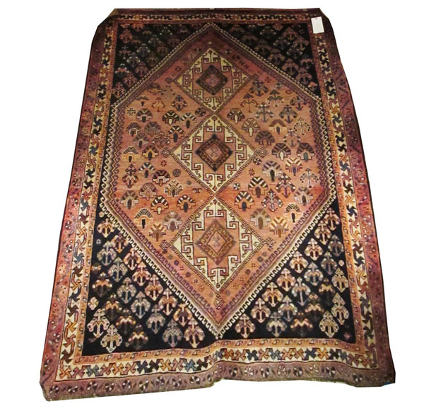 ANTIQUE LORI RUG, 238cm x 155cm, South West Persia, with three ivory medallions on a madder field
