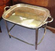 TRAY TABLE, silver plate of rounded rectangular form with gadrooned edge and dolphin cast handles on