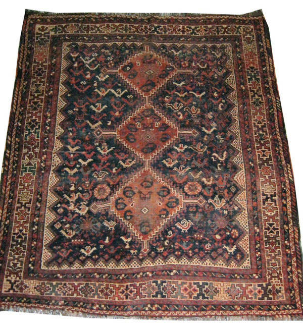 SHIRAZ RUG, 194cm x 168cm, the indigo field of polychrome bird motifs around a brick red stepped