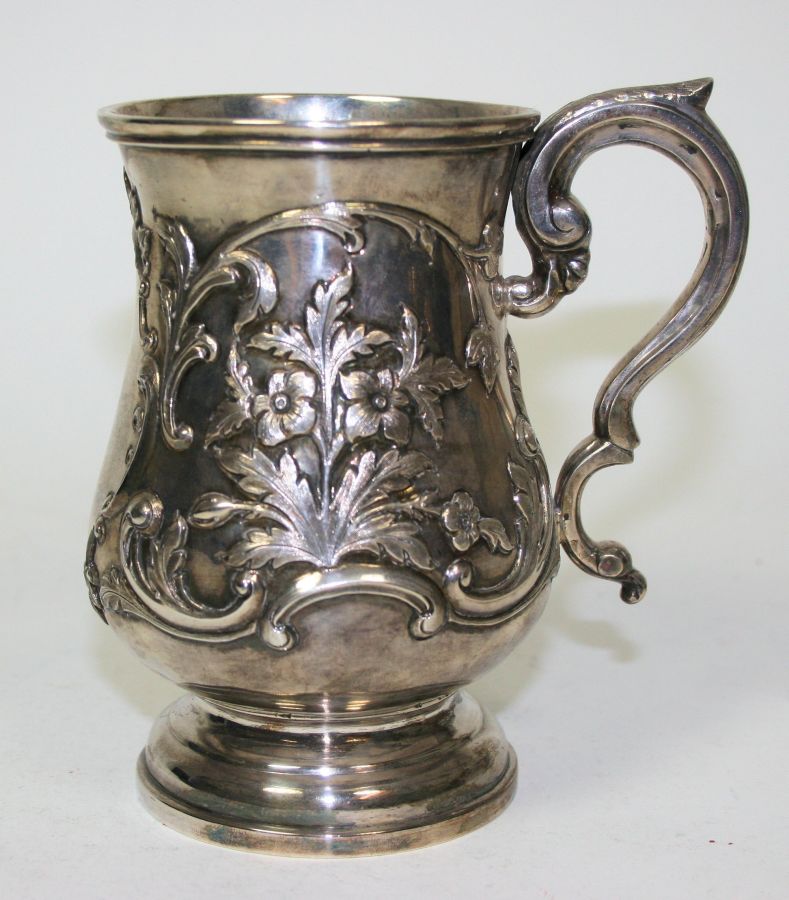 A 19th century Indian Colonial mug Hamilton & Co Calcutta, of baluster form with finely chased