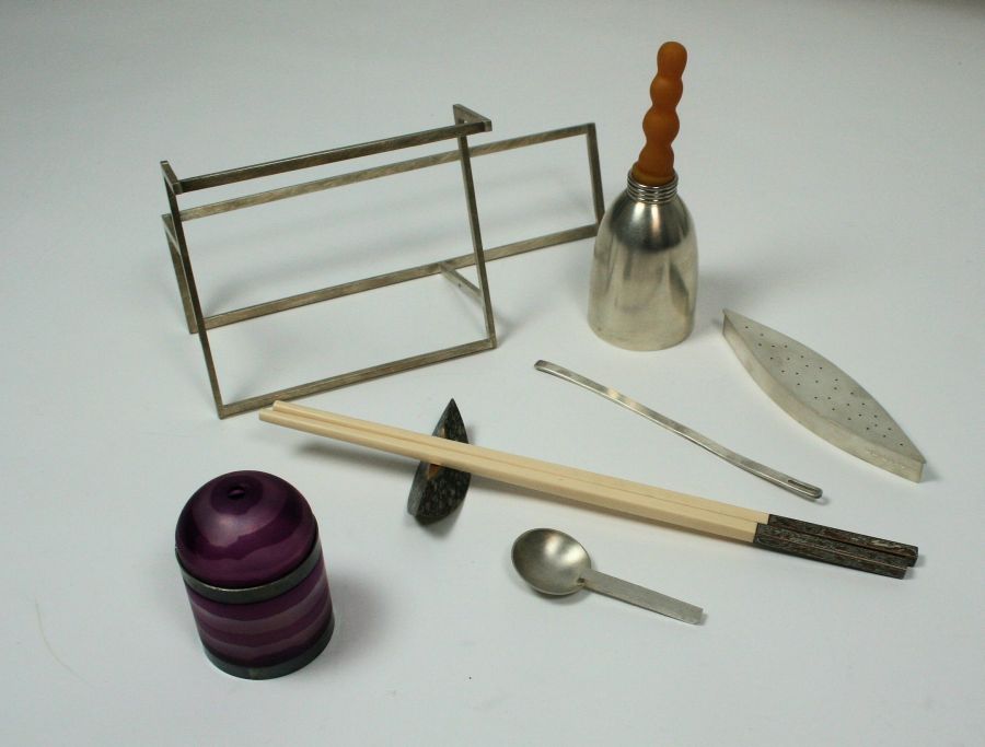 A collection of contemporary silver items to include a pair of silver mounted chop-sticks with