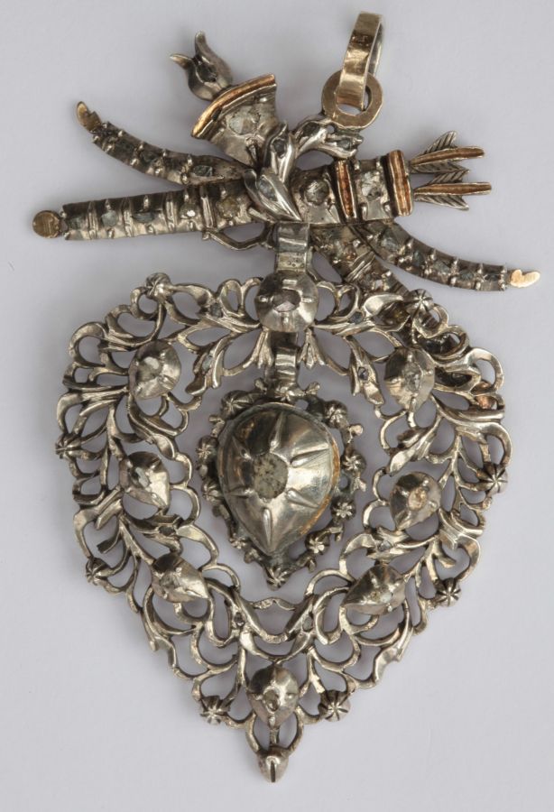 An antique rose cut diamond set pendant the detachable central drop set with a rose cut diamond,