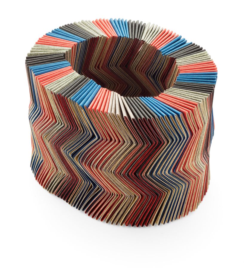 NEL LINSSEN - A paper bracelet composed of folded multi-coloured paper in an optical zig-zag design;