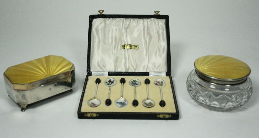 A yellow enamel dressing table box and jewellery box Birmingham 1933, the cut glass bottle and