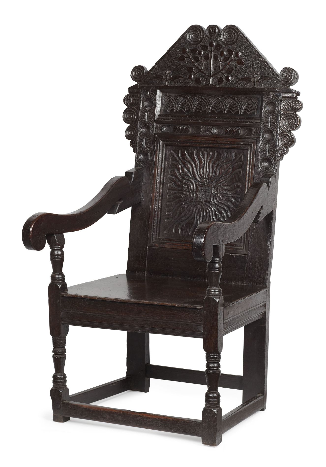 CHARLES II CARVED OAK PANEL BACK ARMCHAIR 17TH CENTURY the double scroll arched pediment centred