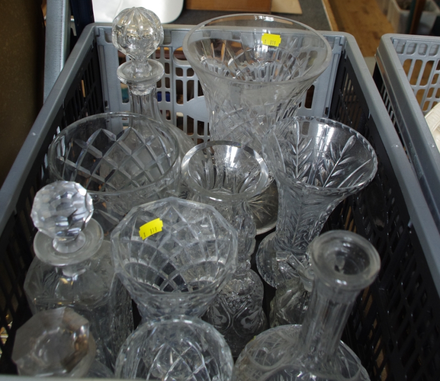 A selection of household glassware to include decanters, vases, jugs, etc