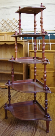 A Victorian style five tier whatnot with turned supports