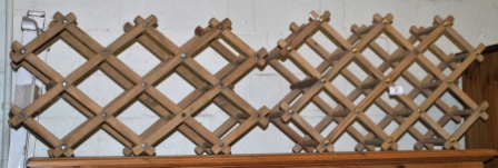 Three adjustable wooden wine racks