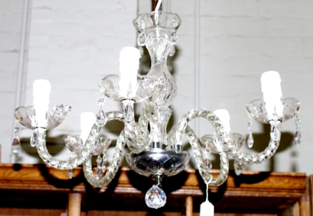 A five branch cut glass chandler with diamond cut decoration to the stem, fitted for hanging