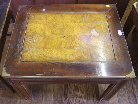 A similar square mahogany and walnut side table with fluted legs and brass adornments