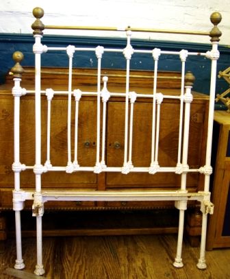 A pair of Victorian style brass and metal bedsteads, 3ft wide, complete with side irons