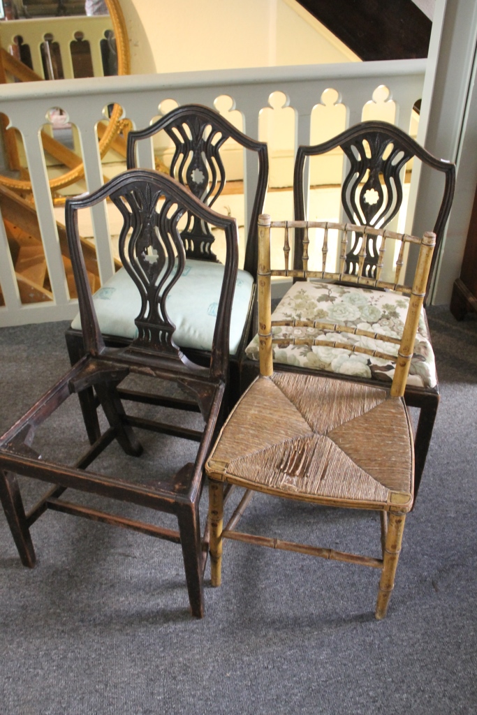 THREE 19TH CENTURY SPLAT BACK DINING CHAIRS, each with Prince of Wales feathers, and a 19th