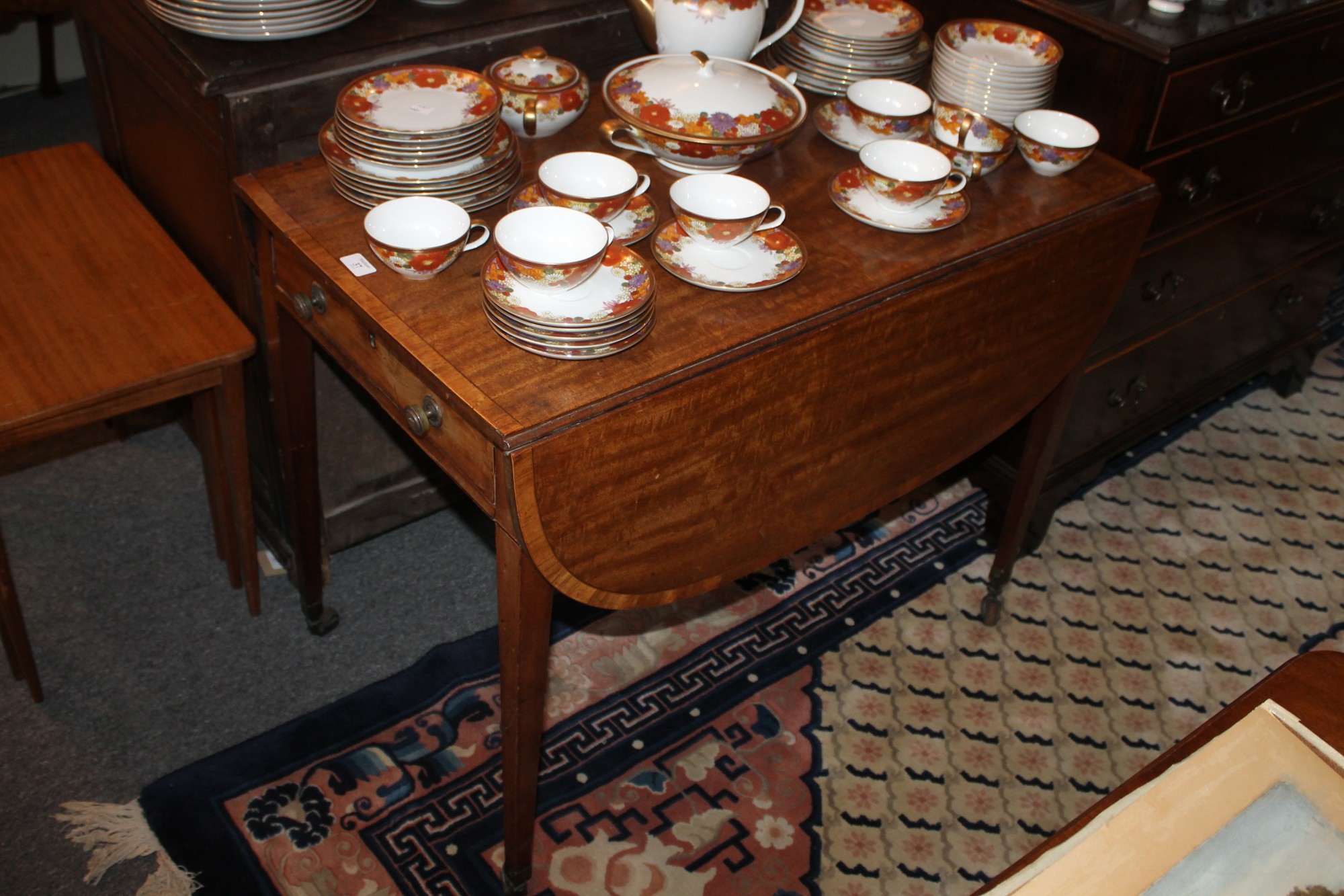 A 19TH CENTURY MAHOGANY DROP LEAF PEMBROKE TABLE with satinwood crossbanded border, 90cm x 114cm