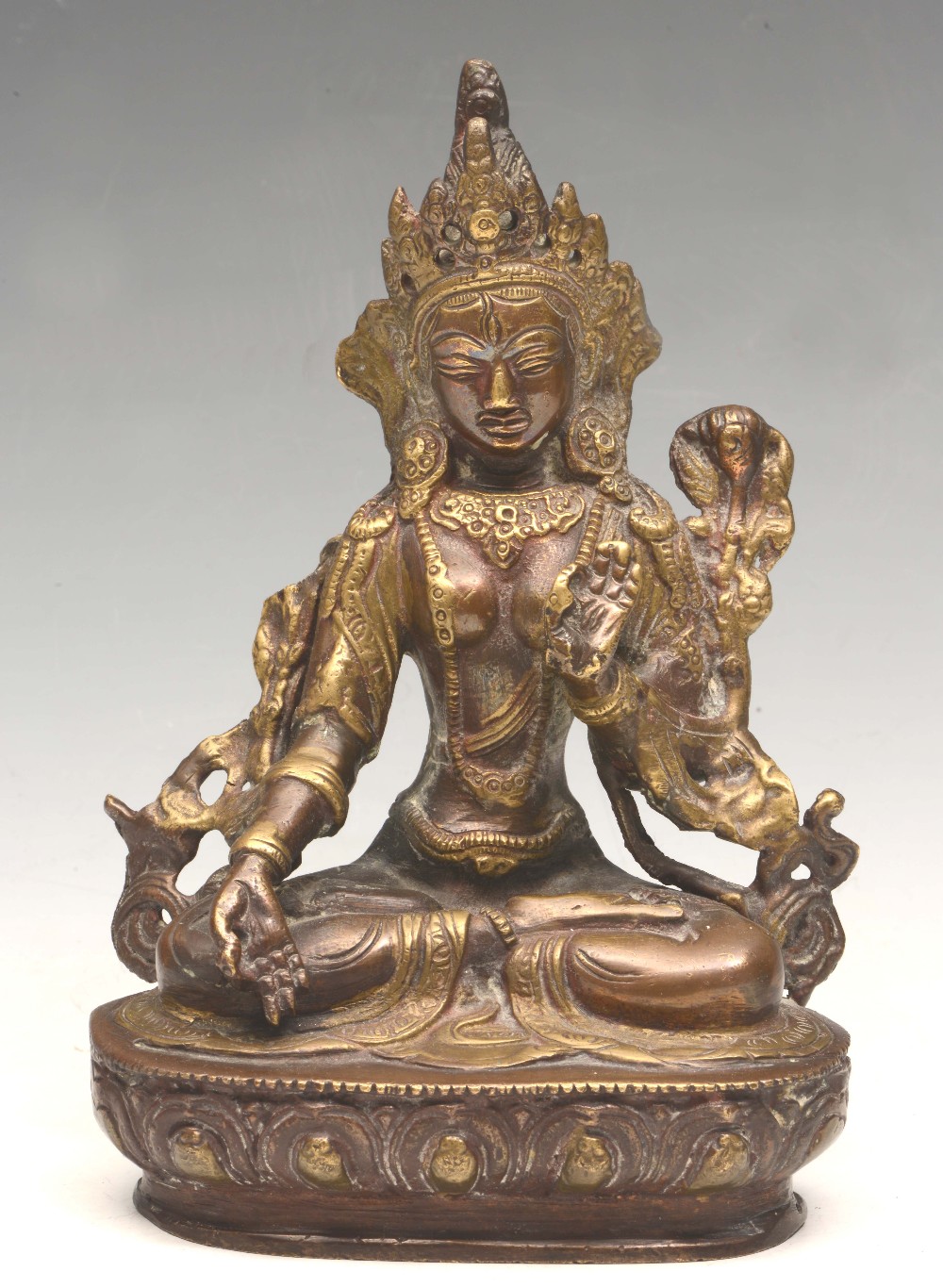 A SINO-TIBETAN FIGURE OF AMITAYUS, with both hands in Vitarka, seated in dhyanasana upon a lotus