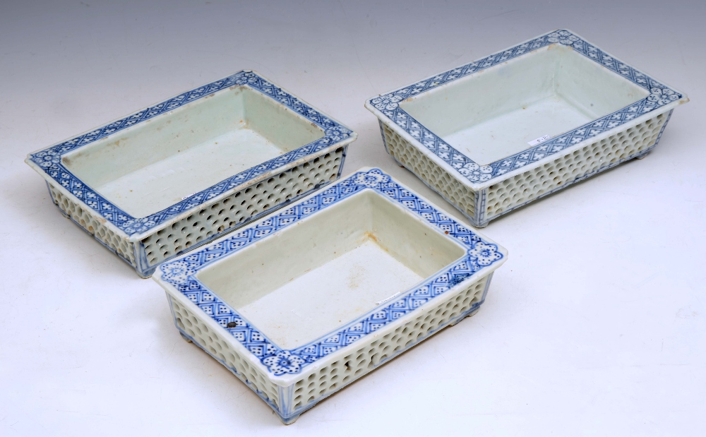 A SET OF THREE CHINESE BLUE AND WHITE PORCELAIN RECTANGULAR JARDINIERES, 9 1/4" (23.75cm) largest.