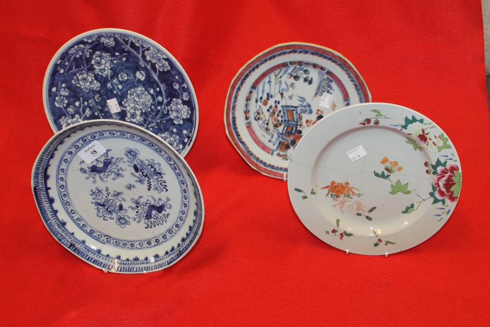 A CHINESE BLUE AND WHITE PORCELAIN BOWL with trophy decoration, a Chinese dish decorated prunus, and