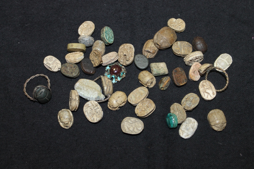 A SMALL COLLECTION OF CERAMIC AND OTHER MODELS OF SCARAB BEETLES, with hieroglyphic decoration