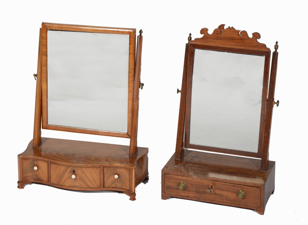 A GEORGIAN MAHOGANY DRESSING TABLE MIRROR on serpentine platform base, fitted four drawers and