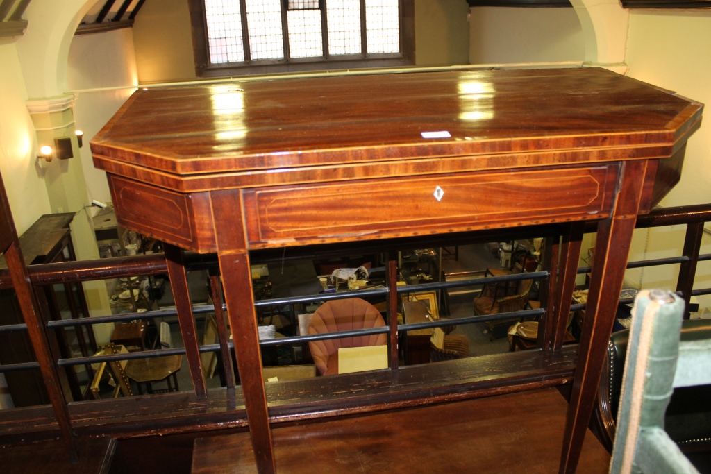 A 19TH CENTURY FOLD-OVER TOP TEA TABLE of canted form on square taper supports with inlaid and