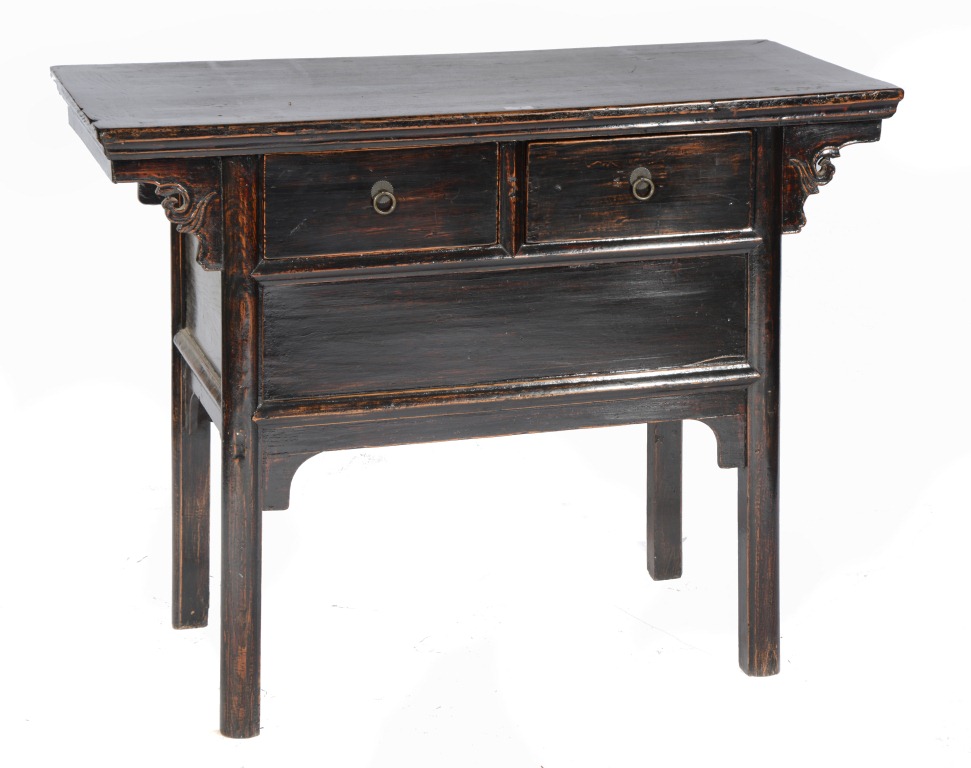 A CHINESE HARDWOOD SIDE TABLE fitted with two frieze drawers with ring handles and applied carved