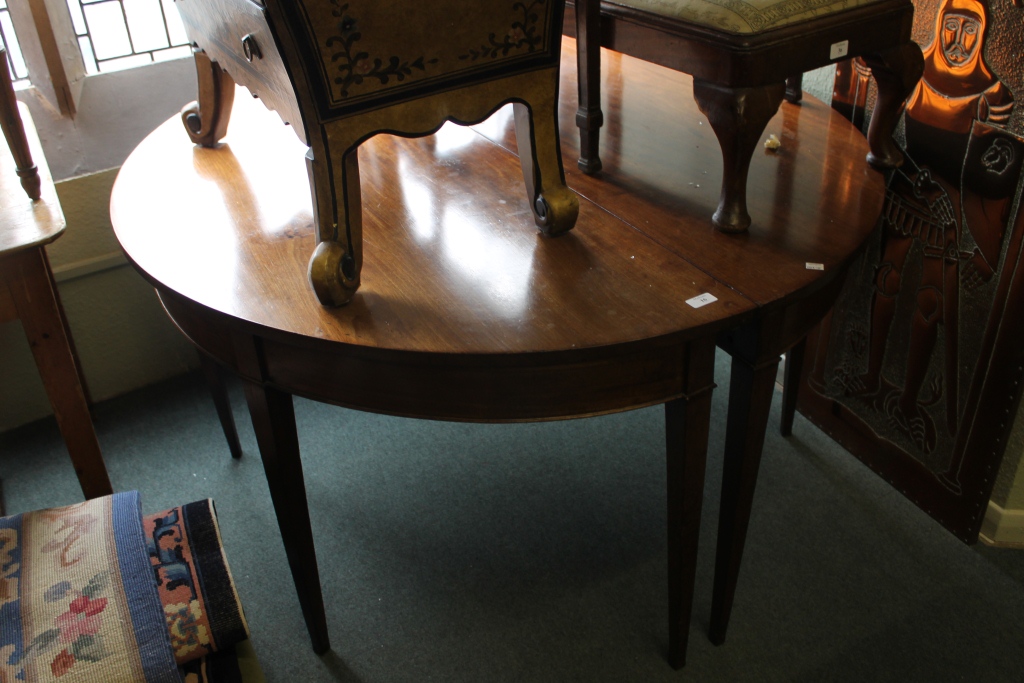 A PAIR OF GEORGIAN MAHOGANY DEMI-LUNE DINING TABLE ENDS of oval form (when together), on square